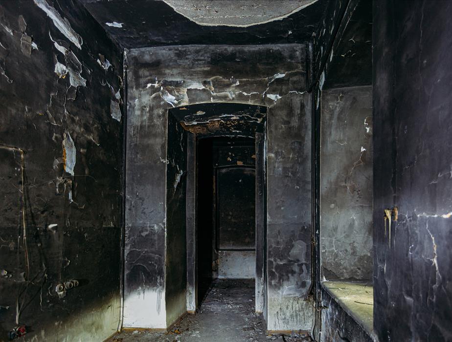 Fire damage in the hallway of a home.
